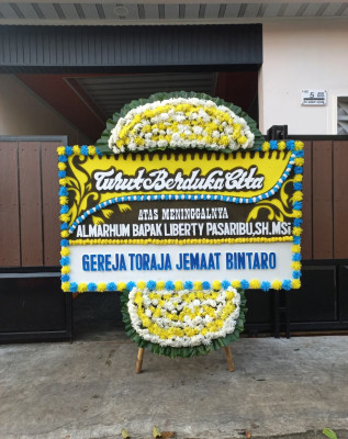 Papan Bunga Duka di Padangtongah Balainanduo